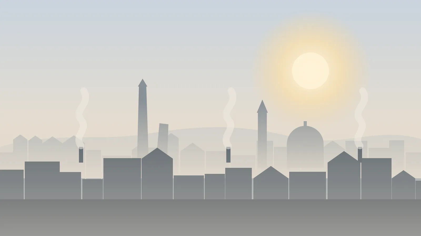 Una città della pianura nella foschia: lo smog si accumula con alta pressione, nebbia e assenza di vento.
