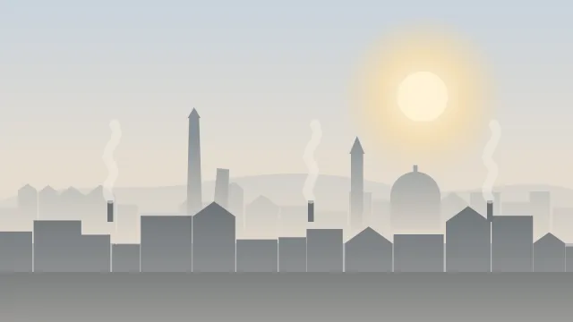 Una città della pianura nella foschia: lo smog si accumula con alta pressione, nebbia e assenza di vento.